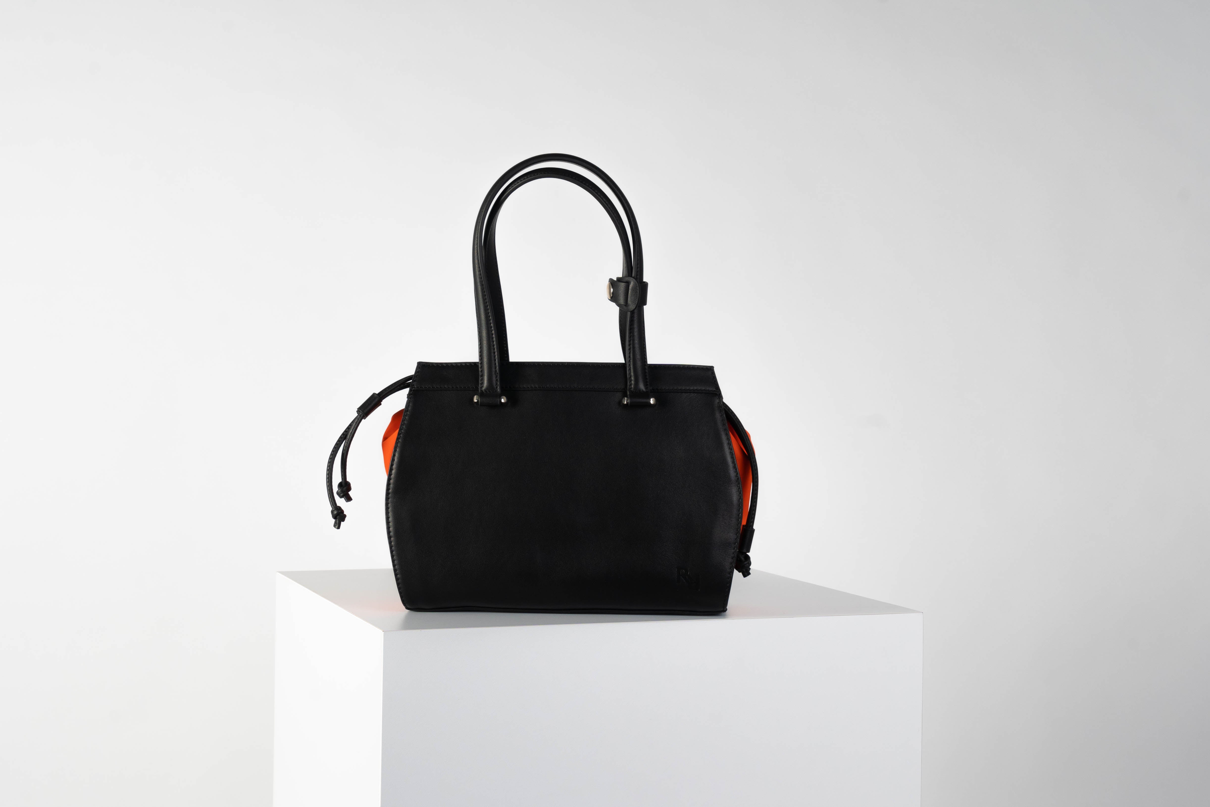 Supple Leather Gusset Bag In Onyx With Tangerine Gusset